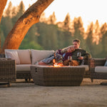 Couple enjoying wine by Denali Small Outdoor Sectional with Fire Pit