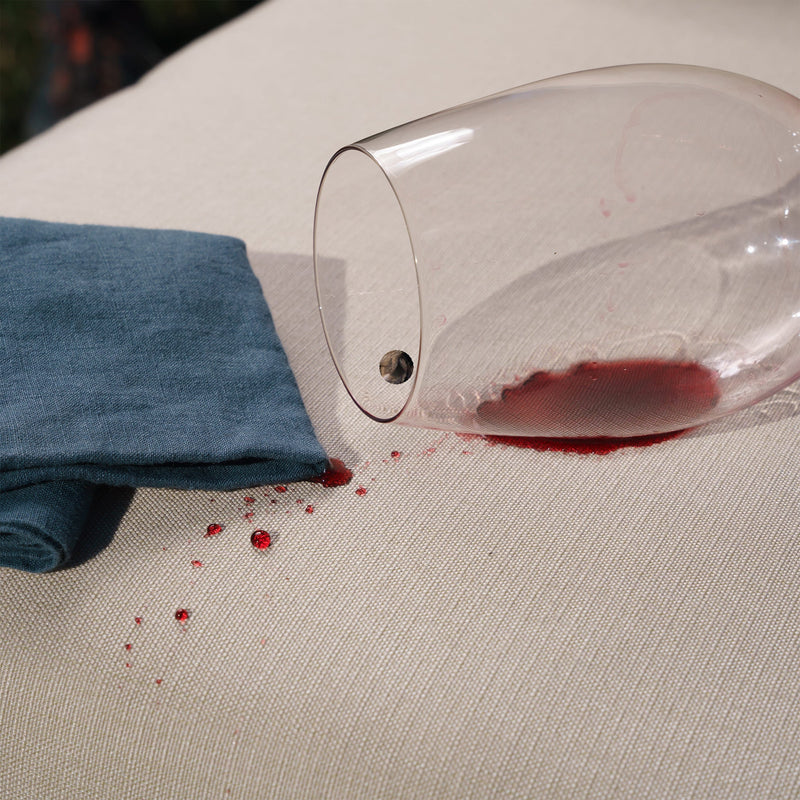 spilled glass of red wine on resistant outdoor furniture